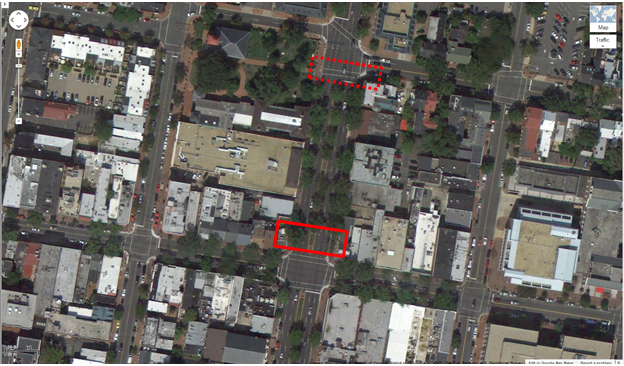 Aerial view of Location 16. The solid red rectangle highlights the intersection of King Street and North Washington Street. The dotted red rectangle highlights the intersection of North Washington Street and Cameron Street in Alexandria, VA. Researchers recorded pedestrians crossing east/west on North Washington Street between King Street and Cameron Street. The aerial view shows mostly commercial building space. 