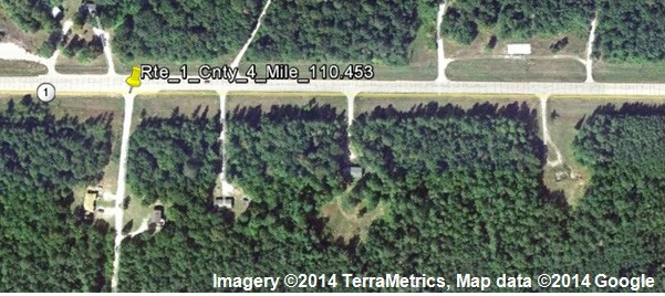 Figure 122. Photo. Locate and mark the point of interest in Google Earthâ„¢ using its coordinates (Minnesota). This figure is a screenshot of the point (MN Route 1, County 4, Milepost 110.453) located and marked with a place marker in Google Earthâ„¢.