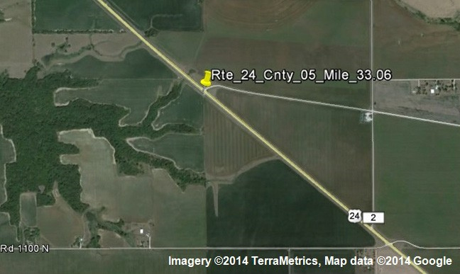 Figure 128. Photo. Locate and mark the roadway segment in Google Earthâ„¢ with its coordinates. This figure is a Google Earthâ„¢ screenshot with marker of milepost 33.06.