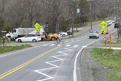 Figure 157. Photo. Zigzag pavement markings. This figure shows an example of zigzag pavement markings. A painted zigzag line in the center of the travel lane is used to indicate upcoming pedestrian crossings or horizontal curves. Zigzag pavement markings are not included in the Manual on Uniform Traffic Control Devices.
