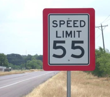 Figure 167. Photo. Red border speed limit sign. This figure shows an example of a red border speed limit sign. A red border speed limit sign is a standard speed limit sign with an added red border. The red border is designed to increase the visibility of the sign, and drivers may recognize an increased sense of importance because of the enhanced red border. The colored border is not Manual on Uniform Traffic Control Devices compliant and requires Federal Highway Administration experimental permission.