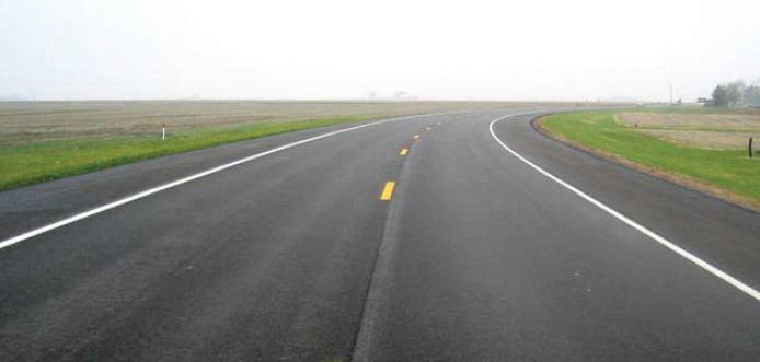 Figure 178. Photo. Lane widening. This figure shows an example of lane widening, which increases the width of a travel lane.