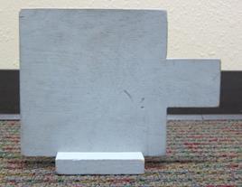 Figure 50. Photo. Close-up of small gray box. The photo is a close-up of the small gray box which is about 9.25 by 7.5 inches. Figure 50. Photo. Close-up of small gray box. The photo is a close-up of the small gray box which is about 9.25 by 7.5 inches.