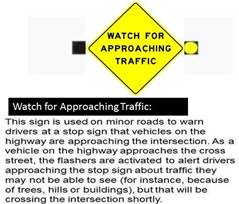 Figure 9. Screenshot. Explanation of ICWS sign on minor road approach. This screenshot features an intersection conflict warning system with a yellow diamond sign that reads, “WATCH FOR APPROACHING TRAFFIC.” It has beacons on both sides (one of which is lit). Below the sign is a black rectangular bar containing the words “Watch for Approaching Traffic.” Below the black bar is a paragraph of text that reads, “This sign is used on minor roads to warn drivers at a stop sign that vehicles on the highway are approaching the intersection. As a vehicle on the highway approaches the cross street, the flashers are activated to alert drivers approaching the stop sign about traffic they may not be able to see (for instance, because of trees, hills or buildings), but that will be crossing the intersection shortly.”