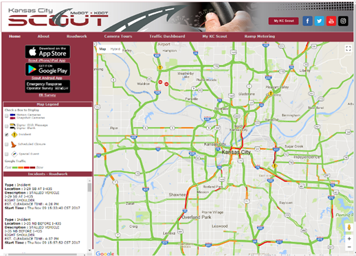 This screenshot shows the Kansas City Scout website homepage. At the top of the page, there are links for the following pages: “Home,” “About,” “Roadwork,” “Camera Tours,” “Traffic Dashboard,” “My KC Scout,” and “Ramp Metering.” Below the navigation in the center of the page is a live-traffic Google® map of Kansas City. To the left of the map is a legend with check boxes next to each of the entries, which include snapshot cameras, detector stations, signs with messages or blank signs, incident, scheduled closure, and special event. Visitors can select the boxes, and the corresponding information will show up on the map. There is also a color bar showing Google® traffic that spans from green (fast) to red (slow). Below the legend, there is an area for zoom control. 