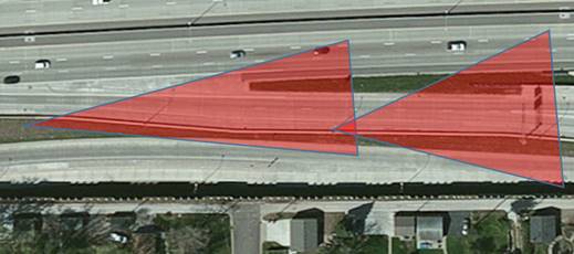 Photo. Camera positions at site 31-3 (I-35W northbound approaching Minnesota TH 62). This aerial photo shows drive behavior and destination selection when exiting to a single ramp with two splits on right. Two attributes are present: exiting lanes—attribute 4120; and exit with downstream split—attribute 4222.