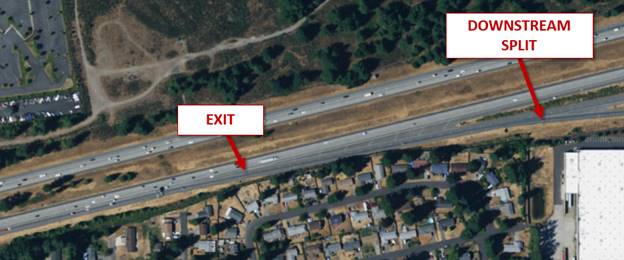 Photo. Aerial view of the interchange at site 43-3. This aerial photo consists of three lanes. A fourth lane is added with the rightmost lane an exit-only lane, and the adjacent lane an option lane. The exit and a downstream split are indicated by labeled arrows.