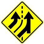 Graphic. Proposed W4-3X sign for multilane entrances. This sign graphic depicts a yellow diamond sign showing two curved up-angled arrows divided by a solid lane marker followed by a dashed lane marker.