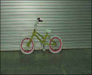 Photo. Child’s bicycle. Click here for more detail.