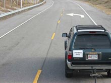 Photo. Object: pavement marking turn arrow. Click here for more detail.