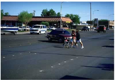 Figure 17. Mother and her two children are crossing at the nonintersection part of the road