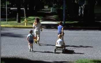 Figure 50. Four school children crossing the street.