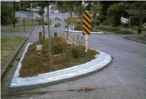 Figure 45. Street narrowing can reduce vehicle speeds and provide pedestrians with a narrower street to cross