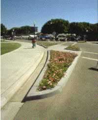 Figure 45. Street narrowing can reduce vehicle speeds and provide pedestrians with a narrower street to cross