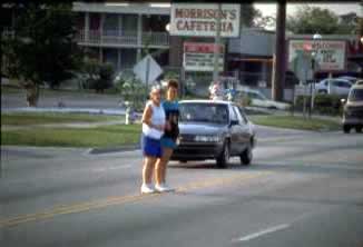 Figure 51. Two pedestrians crossing an undivided highway. Undivided highways had the highest crash risk for pedestrians