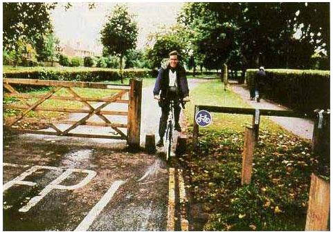 The entrance to this bicycle trail is designed to restrict entry to motor vehicles.