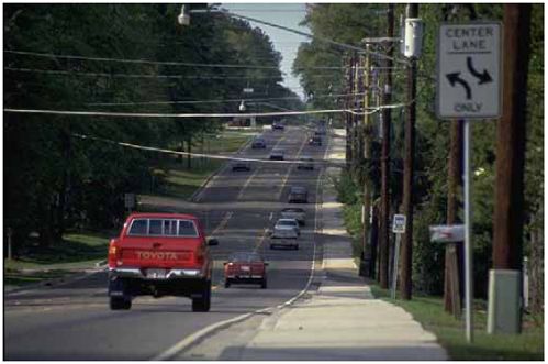 Sidewalks with a landscape strip should be installed to minimize exposure to vehicular traffic.