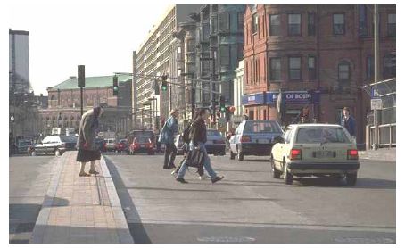 Photo. Older pedestrians often have difficulty negotiating curbs.