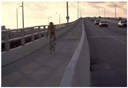 Bicyclists are often forced to use bridge sidewalks when they are not accommodated in the roadway.