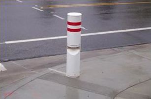 This slide includes four pictures that illustrate examples of different types of pedestrian detection devices. In each picture, a small metal box-like device is attached to a pole and is pointed at the general area where pedestrians are likely to be walking.