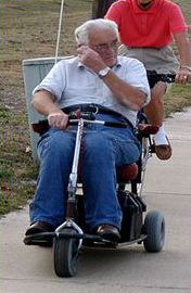 First picture shows a man on a motorized scooter. 