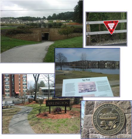 Five pictures show trail elements. 1.) A picture of a tunnel that conveys a trail beneath a road. 2.) A “Yield to Bikes” sign. 3.) A town limit sign. 4.) A historic marker describing an event in the trails vicinity. 5.) A bronze plate used as a place marker for a significant site.