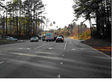 Figure 17. Photograph. Street view of bicycle example 1. This is one of three photographs of the same intersection, also from the street level and from the east, but closer to the intersection.