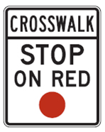 Figure 5. Photo. R10-23 sign from the 2009 MUTCD. Click here for more information.