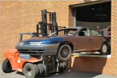 1998 Saturn SL1 being removed from the HDS