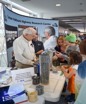 TFHRC Research Civil Engineer Richard Meininger explains the layers of a core sample to a student.