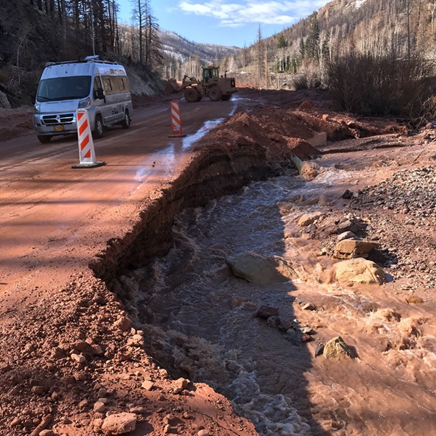 Road washed out by debris flow and mudslide. Photo copyright: UDOT
