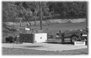 Pendulum nose swinging toward the side of the pickup truck wheel