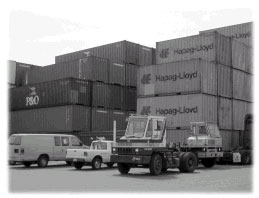 Photo of freight containers waiting to be loaded on to transport vehicles