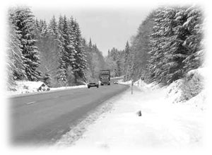 Snow on both sides of a roadway