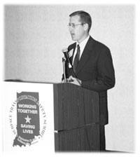 J. Bryan Nichol at podium