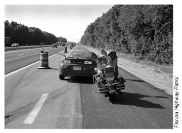 State trooper stopping a vehicle in a workzone