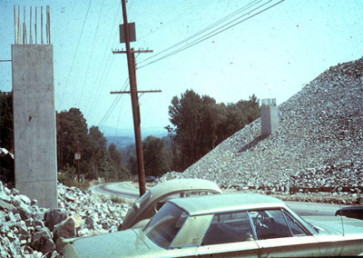 Photo: End Fill with piers shown along a road.