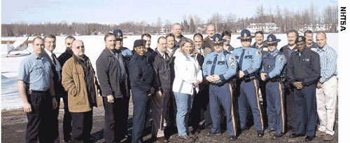 Members of Alaska's law enforcement community, shown here, met at the inaugural Click It or Ticket summit earlier this year to discuss plans to increase belt use to 90 percent in Alaska by the end of 2005. Participants at the summit represented 19 police agencies and 95 percent of the State’s population.