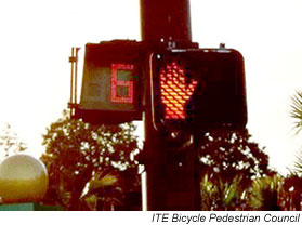 Countdown signals like the one shown above enhance safety by letting pedestrians know how many seconds they have left until the light changes. (Photo Credit: ITE Bicycle Pedestrian Council)