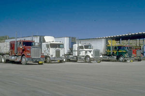 FHWA's recent Talking Freight seminar provided a forum for participants to hear from experts who have successfully implemented freight projects that were sensitive to the human and natural environments. The presentations, for example, addressed the concerns that communities typically have regarding the increased volume of freight trucks, such as the trucks shown above, that can accompany some freight projects.