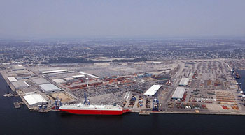 A ship is shown docked at  Dundalk  Marine Terminal in  Baltimore,  MD.  Participants at the National Maritime Recovery Symposium discussed strategies to keep freight moving in the event of a natural disaster or terrorist incident at a  U.S. port. - Photo Credit: Maryland Port Administration