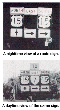 Nighttime and Daytime views of the same route sign