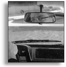 Q-FREE tag behind the rear mirror