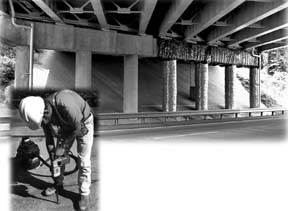 Construction worker works on a highway