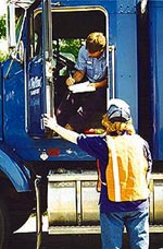 CDL Program supervisor going over a checklist