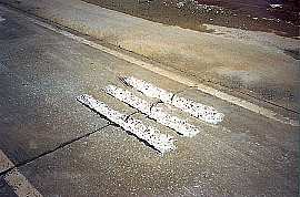 slots for dowel-bar retrofit milled into existing concrete