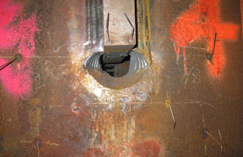 Figure 2 Pile 3 plate C with weld complete, runoff tabs removed at lower end and arc gouges evident as surface has not been ground