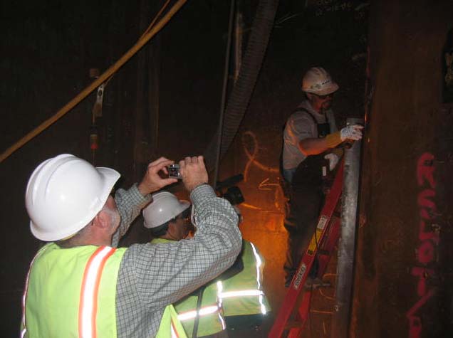 Figure 13: Video and photo documentation during magnetic particle examination.