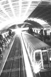 Black and white photo of metro subway rail