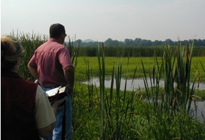 Two scan team stand and view the scenery as they prepare to investigate this wetland mitigation site in Nelson County, KY.